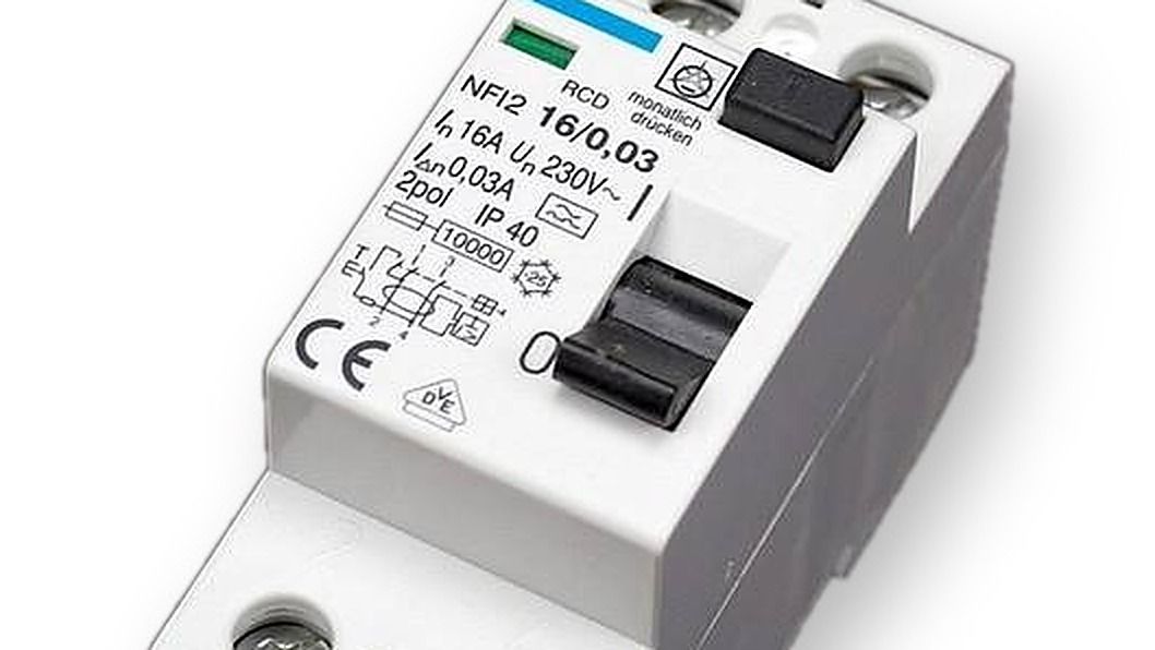 Close-up of a two-pole 30 mA residual current device on a white background